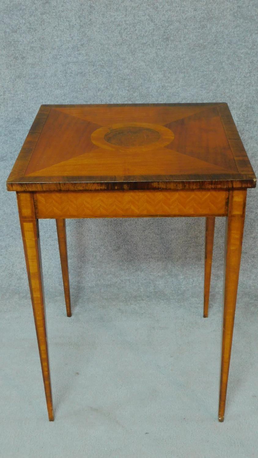 A late 19th century satinwood, rosewood crossbanded and ebony line inlaid centre table on square