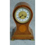 A late 19th century French balloon shaped mantel clock in mahogany and satinwood case. H.30 W.20 D.