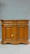 A French provincial style burr elm side cabinet fitted with cupboards and frieze drawers. H.86 W.102