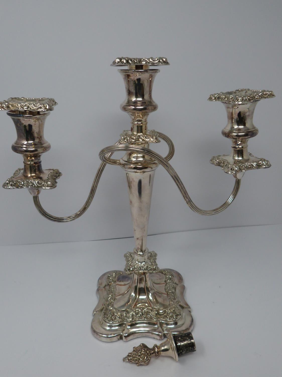 A pair of silver plated candelabra. Repoussé work, elegant swirled design, flame removable finial - Image 4 of 9