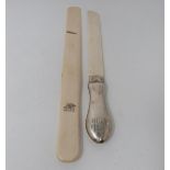 A silver and ivory letter opener with an ivory page turner, letter opener, makers mark WHW for