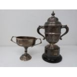 Two silver trophy cups, the larger one engraved 'prsented by eldins ltd for air training corps