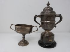 Two silver trophy cups, the larger one engraved 'prsented by eldins ltd for air training corps