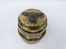 A Wehrmacht trench art paperweight with Eagle and swastika motif to the top. H7.5cm