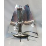 A chrome Art Deco heater in the form of a yacht. Height 74 cm.