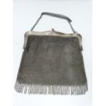 A silver mesh evening purse, 1915, london, Erich Kellerman. Chainlink strap with every link