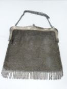 A silver mesh evening purse, 1915, london, Erich Kellerman. Chainlink strap with every link