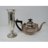A silver vase and silver teapot, silver teapot with ebony handle and finial, hallmarked W.H.S. for