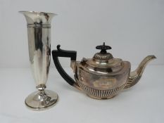 A silver vase and silver teapot, silver teapot with ebony handle and finial, hallmarked W.H.S. for