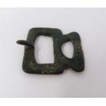 A western Han Chinese 4th century BC bronze buckle, 4 cm x 3.5 cm. (15g).