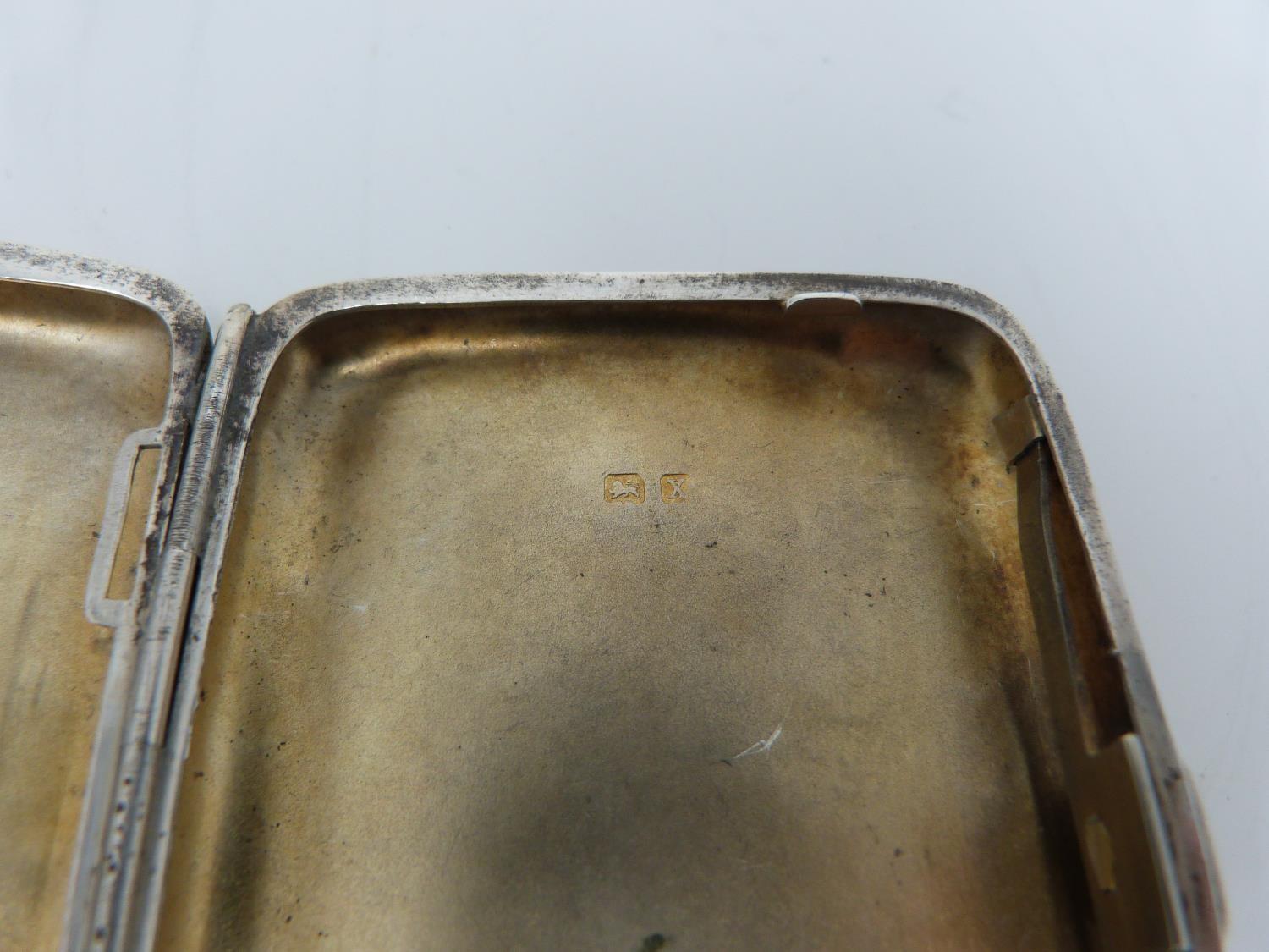 Two silver cigarette cases, the smaller with stylised foliate decoration and central shield - Image 12 of 12