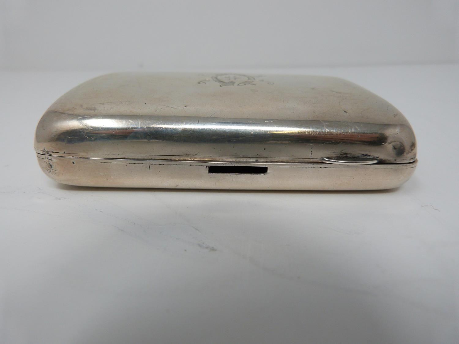 Two silver cigarette cases, the smaller with stylised foliate decoration and central shield - Image 7 of 12