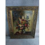 A large 19th century oil on canvas, Italian school flower study, in ornately carved gilt frame.