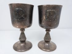 A pair of silver royal commemorative cups, engraved on the base 'Westminster Abbey + 14th November