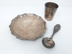 A collection of silver and silver plated items including a French silver plated cup with raised