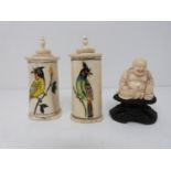 Two bone scent bottles with painted birds and a carved ivory buddah on carved hardwood stand.