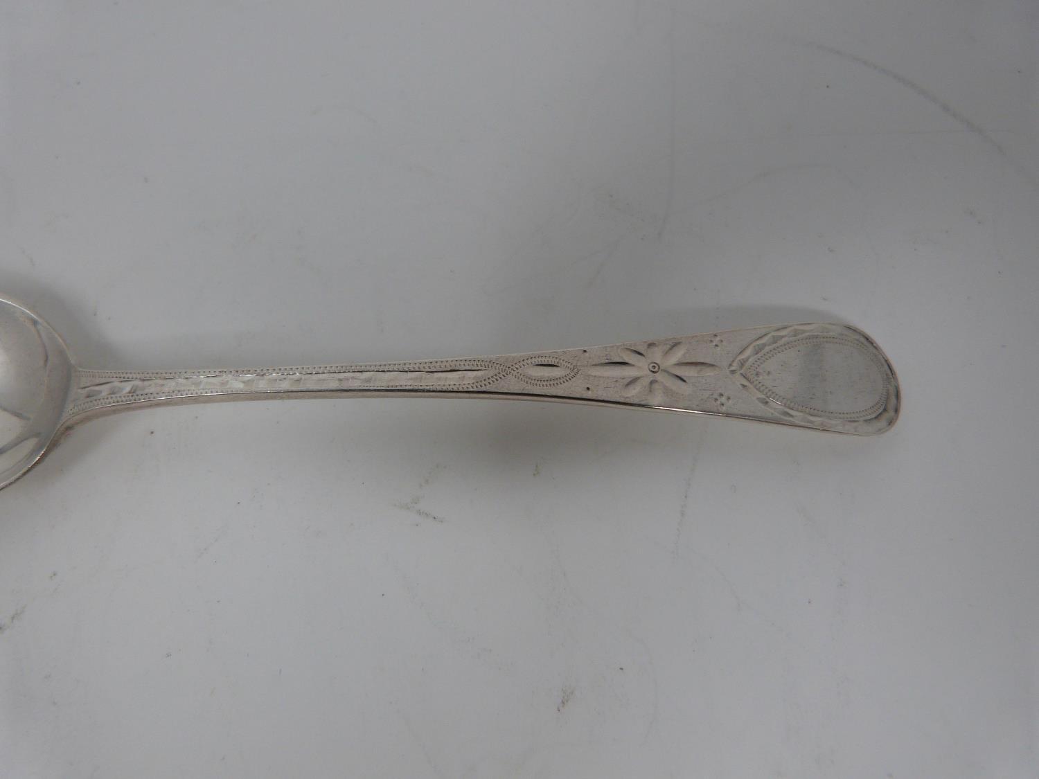 A collection of silver teaspoons including three engraved Georgian silver coffee spoons, hallmarked: - Image 3 of 7