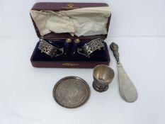 A collection of silver items, including cased cruet with blue glass liners, hallmarked:WD for