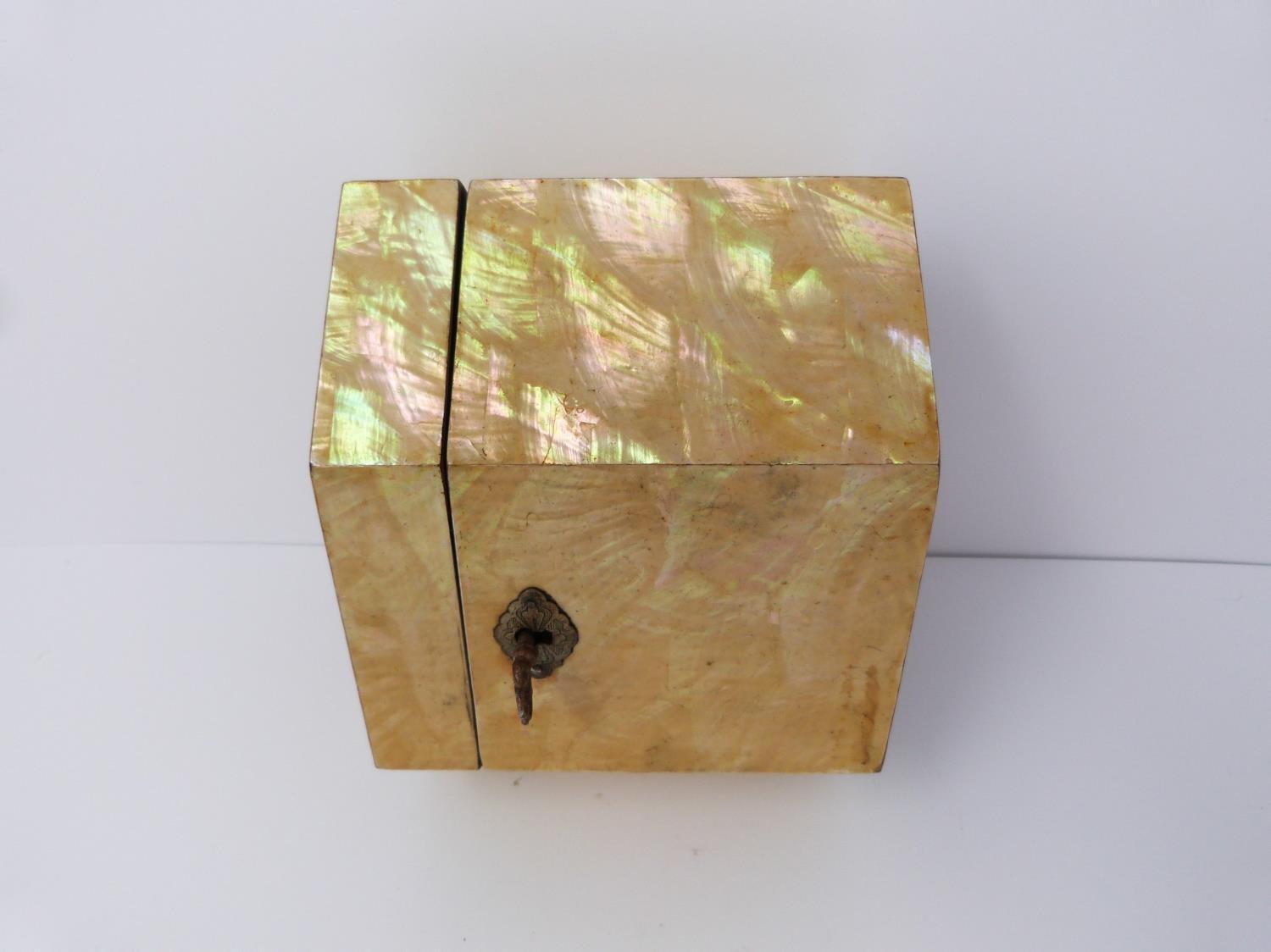 A George III abalone hexagonal tea caddy, silvered lining and inner partition, lockable with key and - Image 4 of 12