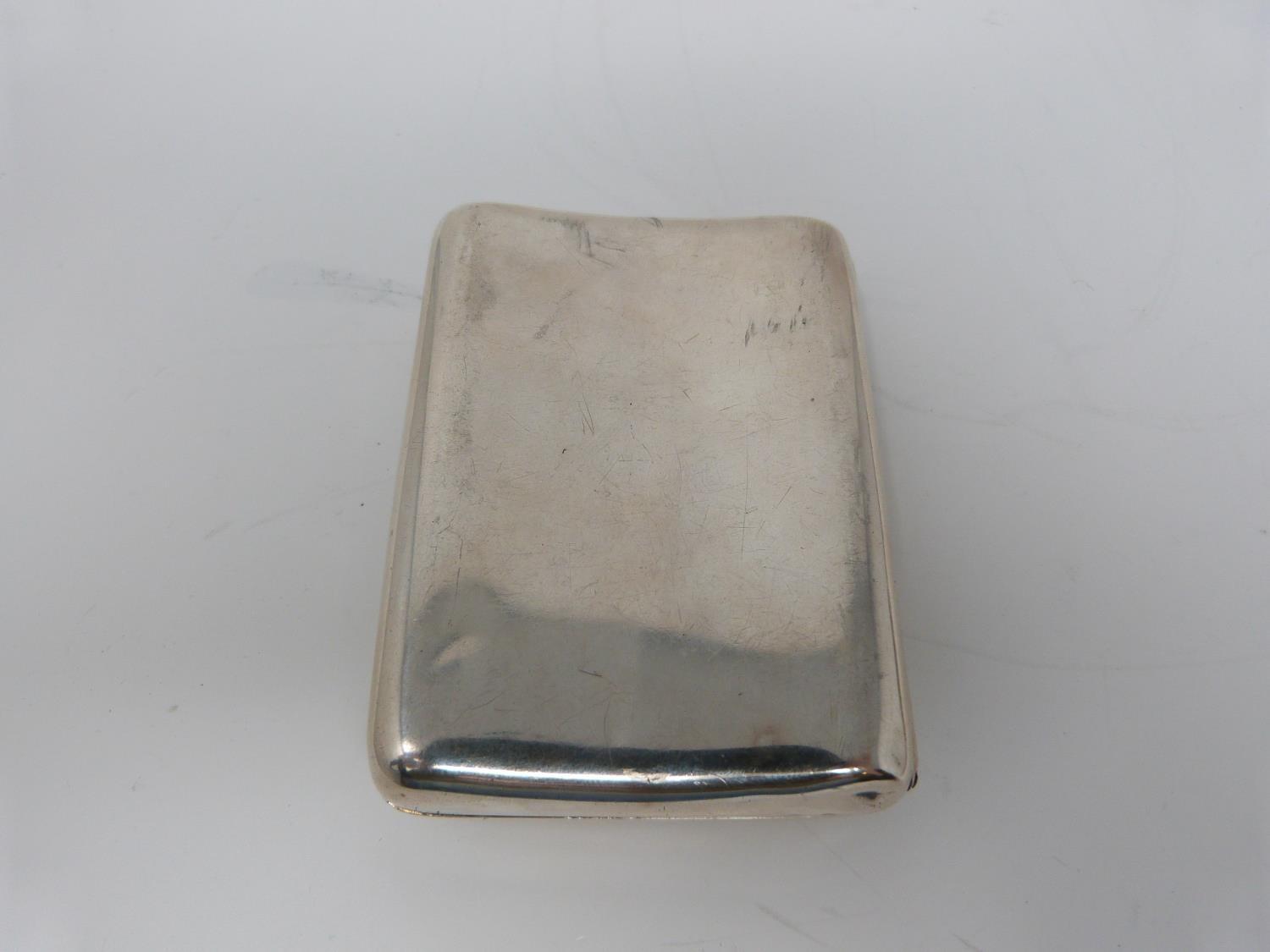 Two silver cigarette cases, the smaller with stylised foliate decoration and central shield - Image 3 of 12