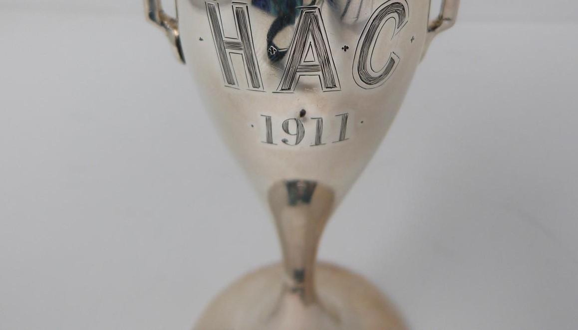 A two handled silver vase. Engraved H.A.C. 1911. Hallmarked: H J C & Co for Henry James Cooper & - Image 3 of 5