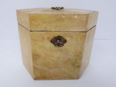 A George III abalone hexagonal tea caddy, silvered lining and inner partition, lockable with key and