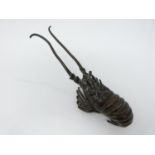 A Japanese bronze lobster. Realistically modelled. Length 20cm.