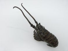 A Japanese bronze lobster. Realistically modelled. Length 20cm.