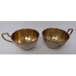 A pair of gilded silver Austrian punch cups, 1872, A city mark, makers mark JR. (169g).