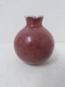 A Kangxi style pomegranate-form water pot with 'peachbloom' glaze, six-character mark to base.