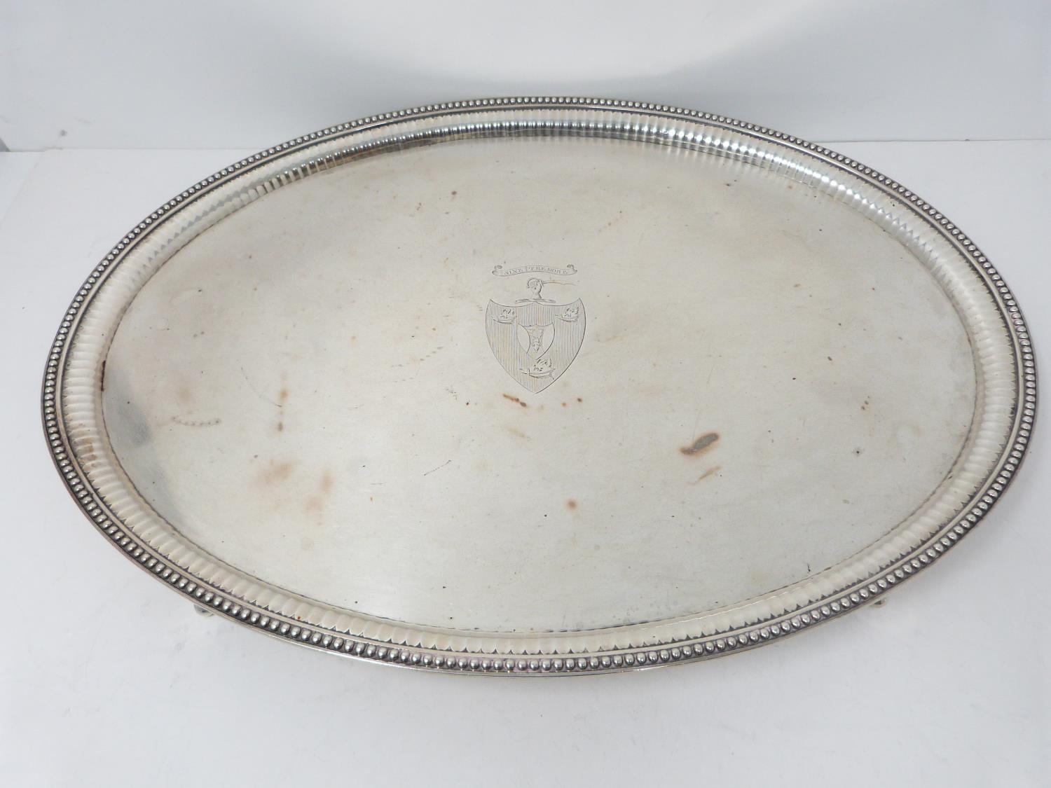 Georgian silver oval tray on four tapering feet. John Wakelin & William Taylor, London, 1781.