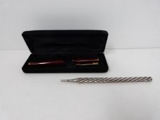 A Victorian Sampson and Mordan white metal pencil and vintage Waterman Fountain pen. Pencil has