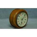 A King George V G.P.O. wooden cased 10" double-sided electric slave dial wall clock within turned