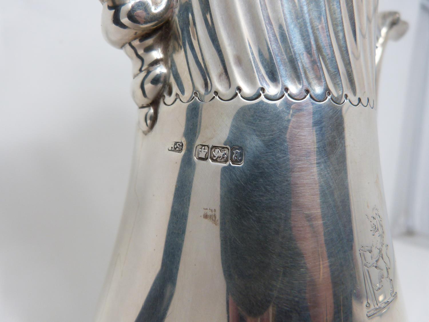 A Victorian sterling sliver coffee pot, with armorial crest on front, ebony handle and scrolling - Image 5 of 7