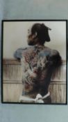 A framed Kusakabe Kimbei Tattoo Photo. The photo has an acrylic gloss protective shield and is ?