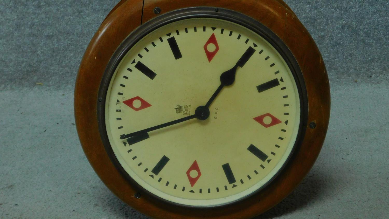 A King George V G.P.O. wooden cased 10" double-sided electric slave dial wall clock within turned - Image 3 of 6