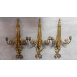 A set of three 19th century twin branch Adam style ormolu wall lights. W.60cm