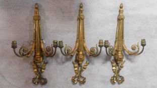 A set of three 19th century twin branch Adam style ormolu wall lights. W.60cm