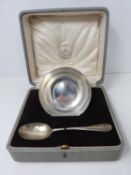 A sterling silver cased set of bowl and spoon. Engraved F.P.C., 1925. Bowl hallmarked WH &S Ltd