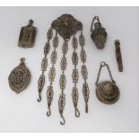 A cut steel french chatelaine with five attachments, mirror, dance card, snuff bottle, propelling