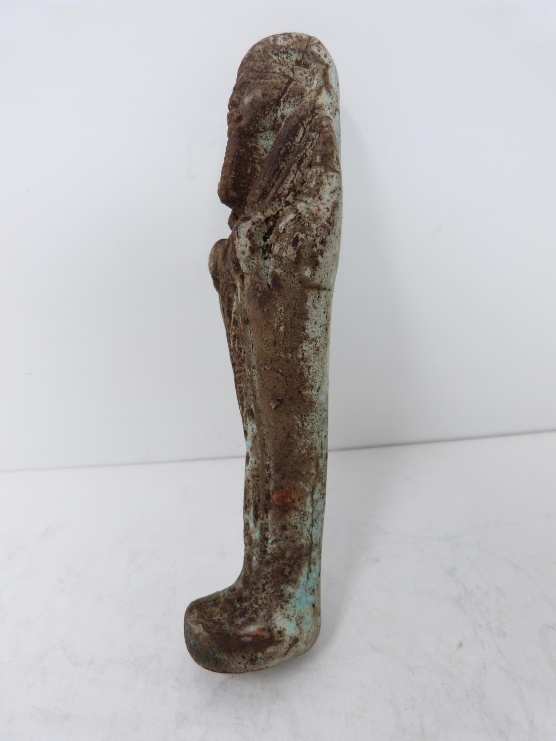 An antique replica of an Egyptian Shabti, pale blue glaze and hieroglyphs to front. Height 4.5cm. - Image 3 of 5