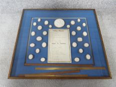 A framed collection of Grand Tour plaster Intaglio seals. With a numbered list of descriptions in