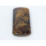 An antique Japanese faux tortoiseshell and lacquer case. Decorated with gilded lacquer cranes,