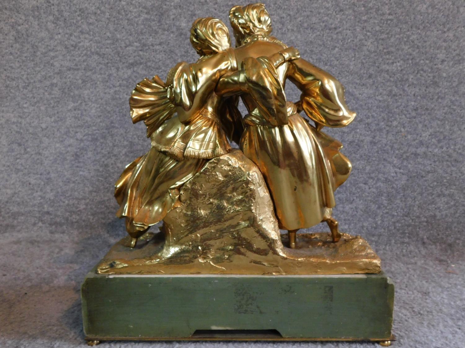 An antique gilded French bronze of a couple, male is wearing a turban and pantaloons, lady is - Image 4 of 4