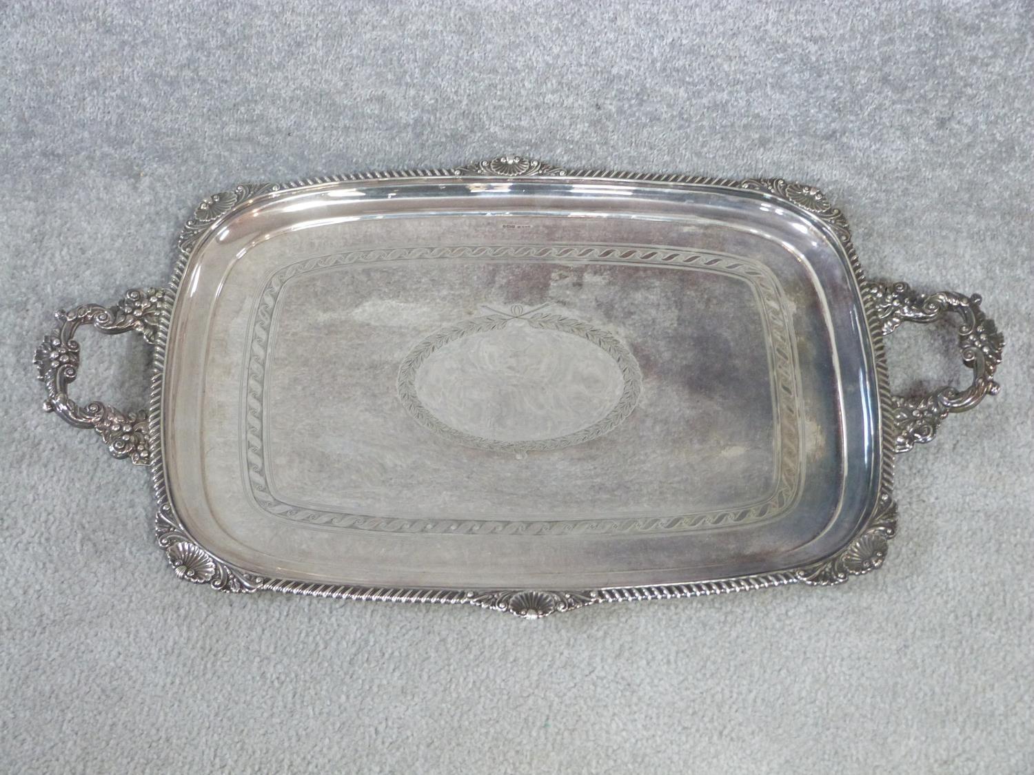 A Victorian silver two handled tray. Hallmarked CE & Co for Charles Ellis & Co, Sheffield, 1899.