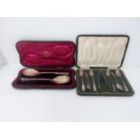 A Victorian cased set of spoons with a cased set of tea spoons and tongs. A pair of silver fruit