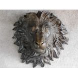 An Italian antique bronze wall mounted lion head. Realistically modelled. 45x46cm