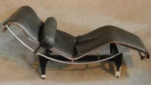 A vintage LC4 black Italian leather chaise longue by Le Corbusier. H.82 W.160 D.52cm