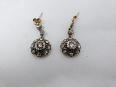 A pair of Victorian old mine diamond cluster drop earrings. Each earing set with nineteen