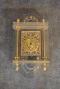 An ornate gilt and perspex wall clock. H.65cm.
